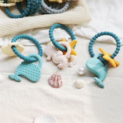 Gıda sınıfı silikon bebek dişleri zehirli olmayan tasarım ve kolay tutma ile BPA ücretsiz silikon diş yüzükleri