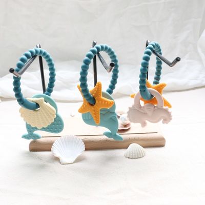 Gıda sınıfı silikon bebek dişleri zehirli olmayan tasarım ve kolay tutma ile BPA ücretsiz silikon diş yüzükleri